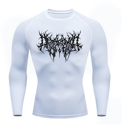 Unlock your ultimate physique with the Shadow Core Compression Rashguard. Engineered for those who embrace the dark gym aesthetic, this premium training shirt combines aggressive style with elite performance.  Why you'll love it: • Ultra-Compression Fit: