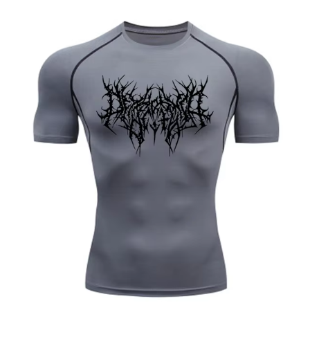 Unlock your ultimate physique with the Shadow Core Compression Rashguard. Engineered for those who embrace the dark gym aesthetic, this premium training shirt combines aggressive style with elite performance.  Why you'll love it: • Ultra-Compression Fit: