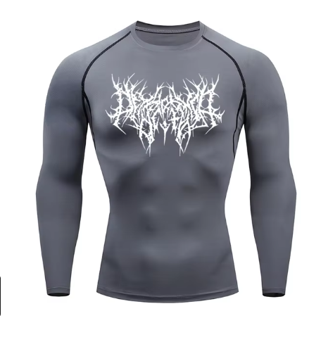 Unlock your ultimate physique with the Shadow Core Compression Rashguard. Engineered for those who embrace the dark gym aesthetic, this premium training shirt combines aggressive style with elite performance.  Why you'll love it: • Ultra-Compression Fit: