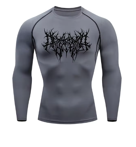 Unlock your ultimate physique with the Shadow Core Compression Rashguard. Engineered for those who embrace the dark gym aesthetic, this premium training shirt combines aggressive style with elite performance.  Why you'll love it: • Ultra-Compression Fit: