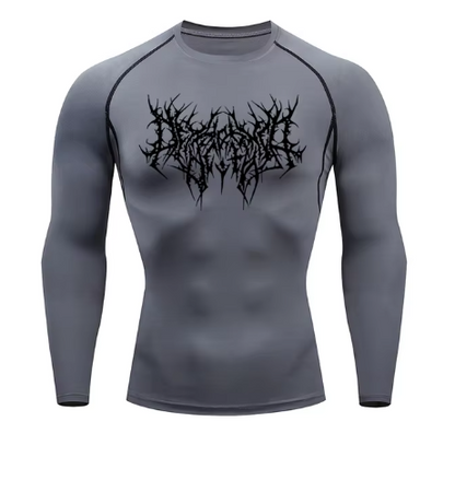 Unlock your ultimate physique with the Shadow Core Compression Rashguard. Engineered for those who embrace the dark gym aesthetic, this premium training shirt combines aggressive style with elite performance.  Why you'll love it: • Ultra-Compression Fit: